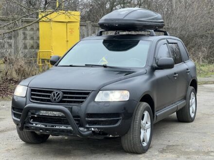 Чорний Фольксваген Туарег, об'ємом двигуна 3 л та пробігом 496 тис. км за 3999 $, фото 1 на Automoto.ua