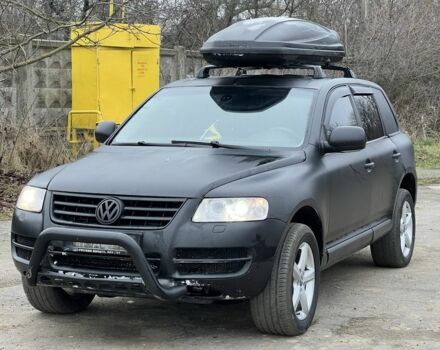 Чорний Фольксваген Туарег, об'ємом двигуна 3 л та пробігом 496 тис. км за 3999 $, фото 1 на Automoto.ua