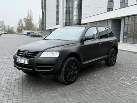 Черный Фольксваген Туарег, объемом двигателя 3 л и пробегом 360 тыс. км за 3999 $, фото 1 на Automoto.ua