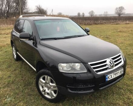 Черный Фольксваген Туарег, объемом двигателя 3 л и пробегом 212 тыс. км за 8555 $, фото 1 на Automoto.ua