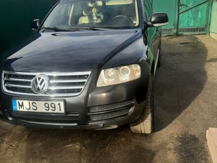 Черный Фольксваген Туарег, объемом двигателя 3 л и пробегом 300 тыс. км за 6500 $, фото 1 на Automoto.ua