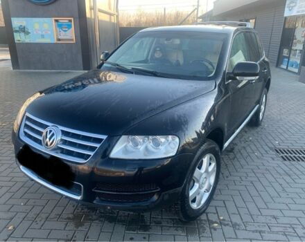 Черный Фольксваген Туарег, объемом двигателя 5 л и пробегом 370 тыс. км за 4200 $, фото 1 на Automoto.ua