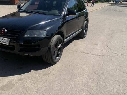 Фольксваген Туарег 2005 в Ромнах на Automoto.ua Черный Фольксваген Туарег, объемом двигателя 4.2 л и пробегом 320 тыс. км за 6999 $, фото 1 на Automoto.ua