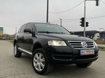 Черный Фольксваген Туарег, объемом двигателя 2.97 л и пробегом 390 тыс. км за 8700 $, фото 1 на Automoto.ua