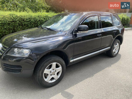 Фольксваген Туарег 2005 у Белой Церкве на Automoto.ua Чорний Фольксваген Туарег, об'ємом двигуна 3 л та пробігом 270 тис. км за 9000 $, фото 1 на Automoto.ua