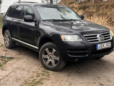 Чорний Фольксваген Туарег, об'ємом двигуна 3 л та пробігом 422 тис. км за 5000 $, фото 1 на Automoto.ua