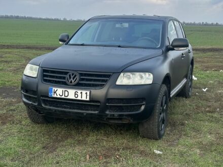 Чорний Фольксваген Туарег, об'ємом двигуна 3 л та пробігом 326 тис. км за 4800 $, фото 1 на Automoto.ua