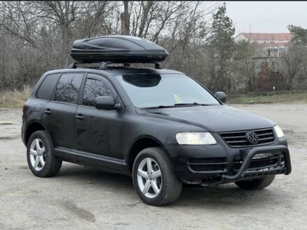 Черный Фольксваген Туарег, объемом двигателя 0 л и пробегом 320 тыс. км за 3600 $, фото 1 на Automoto.ua