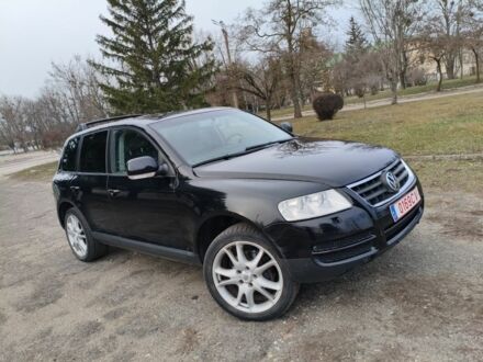 Чорний Фольксваген Туарег, об'ємом двигуна 3 л та пробігом 300 тис. км за 6500 $, фото 1 на Automoto.ua