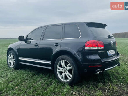 Фольксваген Туарег 2005 у Дніпро (Дніпропетровську) на Automoto.ua Чорний Фольксваген Туарег, об'ємом двигуна 6 л та пробігом 400 тис. км за 11000 $, фото 1 на Automoto.ua