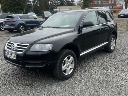 Фольксваген Туарег 2005 у Хмельницькому на Automoto.ua Чорний Фольксваген Туарег, об'ємом двигуна 2.46 л та пробігом 190 тис. км за 8800 $, фото 1 на Automoto.ua