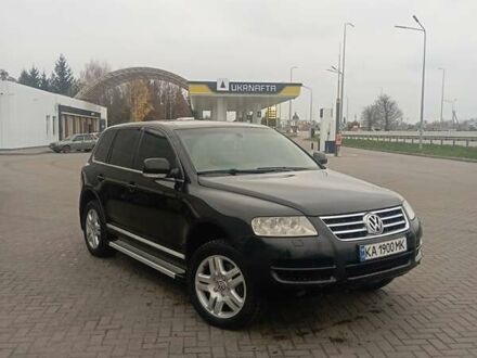 Черный Фольксваген Туарег, объемом двигателя 4.17 л и пробегом 316 тыс. км за 7500 $, фото 1 на Automoto.ua