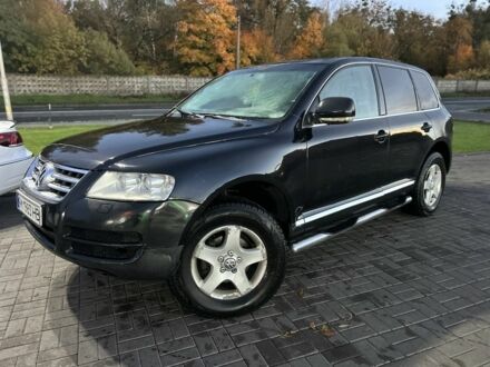 Черный Фольксваген Туарег, объемом двигателя 2.5 л и пробегом 466 тыс. км за 5800 $, фото 1 на Automoto.ua