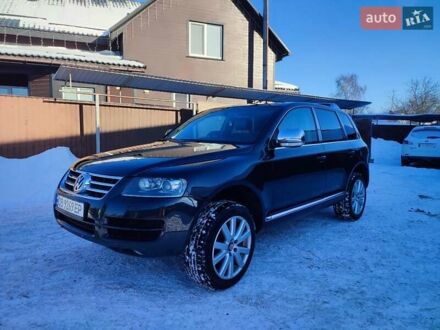 Чорний Фольксваген Туарег, об'ємом двигуна 2.5 л та пробігом 336 тис. км за 9500 $, фото 1 на Automoto.ua