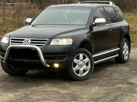 Чорний Фольксваген Туарег, об'ємом двигуна 3 л та пробігом 325 тис. км за 5999 $, фото 1 на Automoto.ua