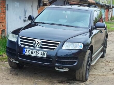 Фольксваген Туарег 2005 в Харькове на Automoto.ua Черный Фольксваген Туарег, объемом двигателя 2.5 л и пробегом 320 тыс. км за 6861 $, фото 1 на Automoto.ua