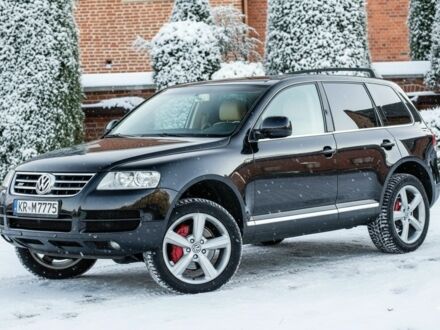 Черный Фольксваген Туарег, объемом двигателя 3 л и пробегом 266 тыс. км за 4350 $, фото 1 на Automoto.ua