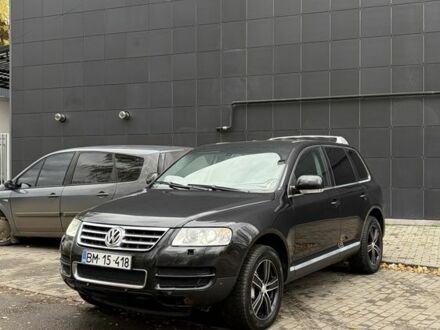 Фольксваген Туарег 2006 у Славянске на Automoto.ua Чорний Фольксваген Туарег, об'ємом двигуна 5 л та пробігом 300 тис. км за 4700 $, фото 1 на Automoto.ua