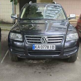 Черный Фольксваген Туарег, объемом двигателя 3.2 л и пробегом 360 тыс. км за 9500 $, фото 1 на Automoto.ua