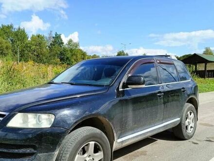 Черный Фольксваген Туарег, объемом двигателя 3 л и пробегом 292 тыс. км за 11500 $, фото 1 на Automoto.ua