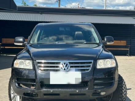 Черный Фольксваген Туарег, объемом двигателя 3 л и пробегом 190 тыс. км за 5000 $, фото 1 на Automoto.ua