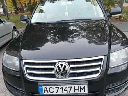Чорний Фольксваген Туарег, об'ємом двигуна 3 л та пробігом 285 тис. км за 8500 $, фото 1 на Automoto.ua