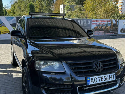 Черный Фольксваген Туарег, объемом двигателя 5 л и пробегом 270 тыс. км за 8750 $, фото 1 на Automoto.ua