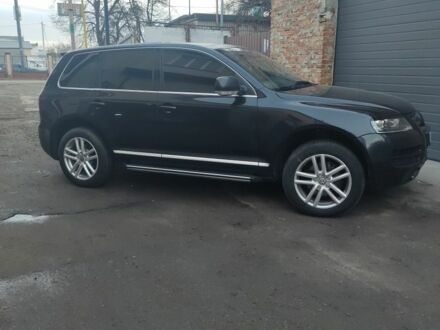 Черный Фольксваген Туарег, объемом двигателя 4.2 л и пробегом 250 тыс. км за 5700 $, фото 1 на Automoto.ua