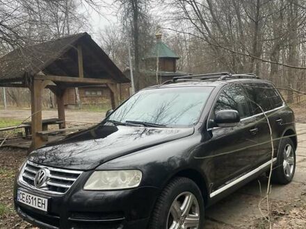 Черный Фольксваген Туарег, объемом двигателя 2.97 л и пробегом 280 тыс. км за 10240 $, фото 1 на Automoto.ua