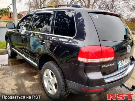 Черный Фольксваген Туарег, объемом двигателя 3 л и пробегом 307 тыс. км за 9350 $, фото 1 на Automoto.ua