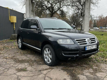 Черный Фольксваген Туарег, объемом двигателя 2.97 л и пробегом 301 тыс. км за 8950 $, фото 1 на Automoto.ua