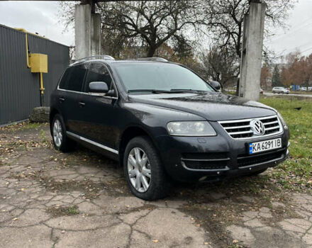 Черный Фольксваген Туарег, объемом двигателя 2.97 л и пробегом 301 тыс. км за 8950 $, фото 1 на Automoto.ua