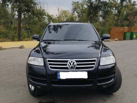 Чорний Фольксваген Туарег, об'ємом двигуна 3 л та пробігом 430 тис. км за 7200 $, фото 1 на Automoto.ua