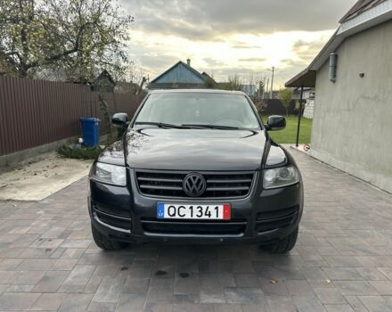 Черный Фольксваген Туарег, объемом двигателя 3 л и пробегом 490 тыс. км за 5700 $, фото 1 на Automoto.ua