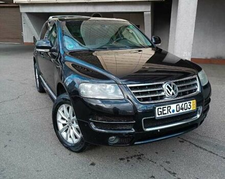 Черный Фольксваген Туарег, объемом двигателя 2.97 л и пробегом 299 тыс. км за 6000 $, фото 1 на Automoto.ua