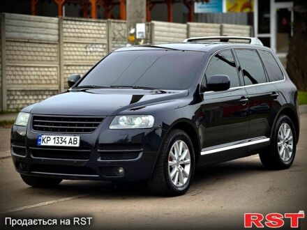 Чорний Фольксваген Туарег, об'ємом двигуна 3 л та пробігом 350 тис. км за 10999 $, фото 1 на Automoto.ua