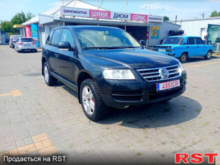 Черный Фольксваген Туарег, объемом двигателя 3.2 л и пробегом 318 тыс. км за 4950 $, фото 1 на Automoto.ua