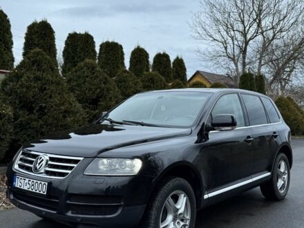 Черный Фольксваген Туарег, объемом двигателя 3 л и пробегом 232 тыс. км за 6200 $, фото 1 на Automoto.ua