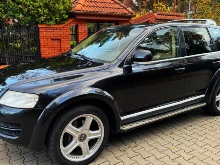 Черный Фольксваген Туарег, объемом двигателя 3 л и пробегом 280 тыс. км за 3100 $, фото 1 на Automoto.ua