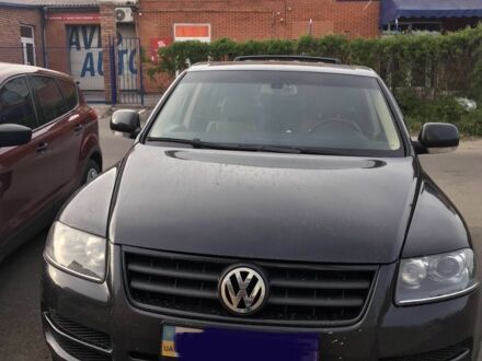 Чорний Фольксваген Туарег, об'ємом двигуна 2.5 л та пробігом 300 тис. км за 10500 $, фото 1 на Automoto.ua