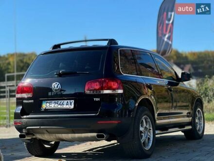 Фольксваген Туарег 2006 у Сторожинце на Automoto.ua Чорний Фольксваген Туарег, об'ємом двигуна 2.5 л та пробігом 223 тис. км за 9700 $, фото 1 на Automoto.ua