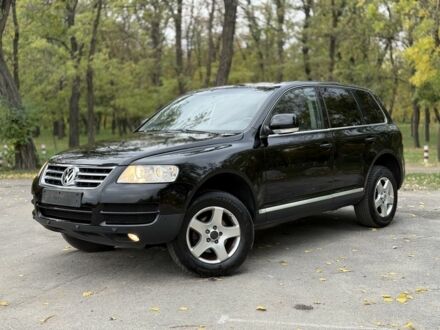 Чорний Фольксваген Туарег, об'ємом двигуна 2.5 л та пробігом 285 тис. км за 6250 $, фото 1 на Automoto.ua