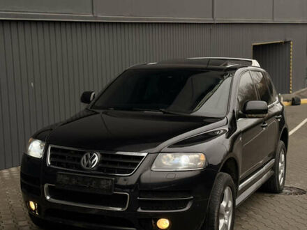 Черный Фольксваген Туарег, объемом двигателя 4.9 л и пробегом 340 тыс. км за 6900 $, фото 1 на Automoto.ua