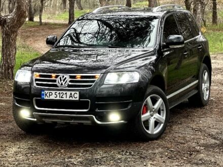 Черный Фольксваген Туарег, объемом двигателя 3 л и пробегом 337 тыс. км за 11000 $, фото 1 на Automoto.ua