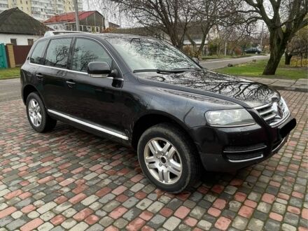 Черный Фольксваген Туарег, объемом двигателя 3 л и пробегом 270 тыс. км за 6500 $, фото 1 на Automoto.ua