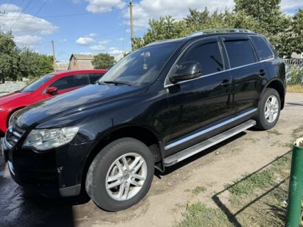 Чорний Фольксваген Туарег, об'ємом двигуна 3 л та пробігом 330 тис. км за 10500 $, фото 1 на Automoto.ua