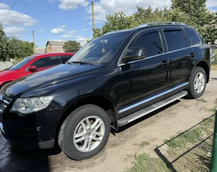 Черный Фольксваген Туарег, объемом двигателя 3 л и пробегом 330 тыс. км за 10500 $, фото 1 на Automoto.ua