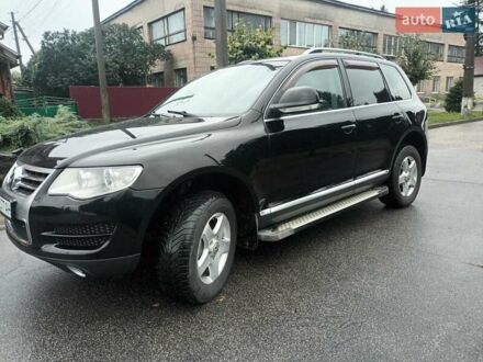 Черный Фольксваген Туарег, объемом двигателя 3 л и пробегом 298 тыс. км за 10800 $, фото 1 на Automoto.ua