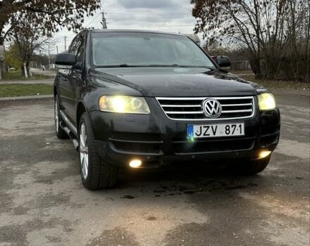 Чорний Фольксваген Туарег, об'ємом двигуна 3 л та пробігом 250 тис. км за 3350 $, фото 1 на Automoto.ua