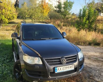 Черный Фольксваген Туарег, объемом двигателя 3 л и пробегом 270 тыс. км за 9500 $, фото 1 на Automoto.ua